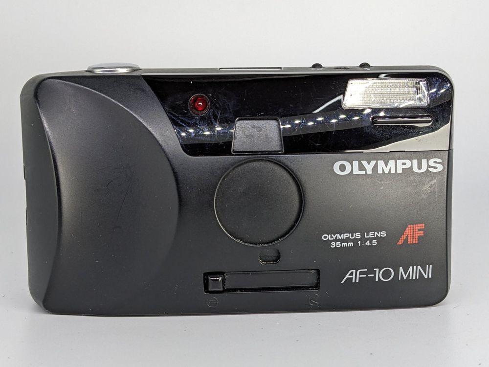 Appareil Photo Compact Olympus AF-10 Mini – 35mm, Objectif 35mm F/4.5 – Noir (Garantie 6 Mois)