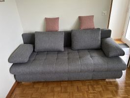 Schlafsofa in Grau zu verkaufen.