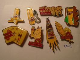 8 ver. Hürlimann Bier Pins (O2)