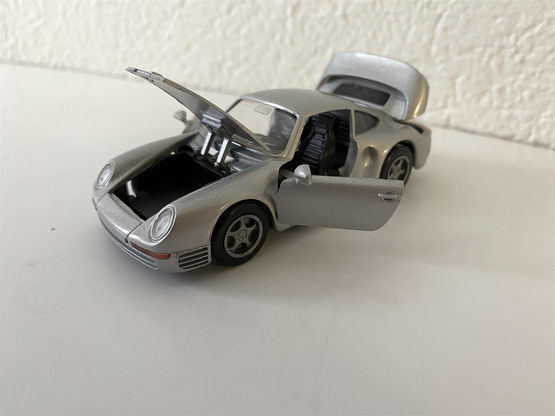 Porsche Modellini d'auto: Porsche 959 1-43 silber NZG BRD OVP – Nuovo e nell'imballaggio originale da Stäfa venduto da elcondor245 5