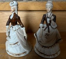 Zwei schmucke antike Porzellan Figuren