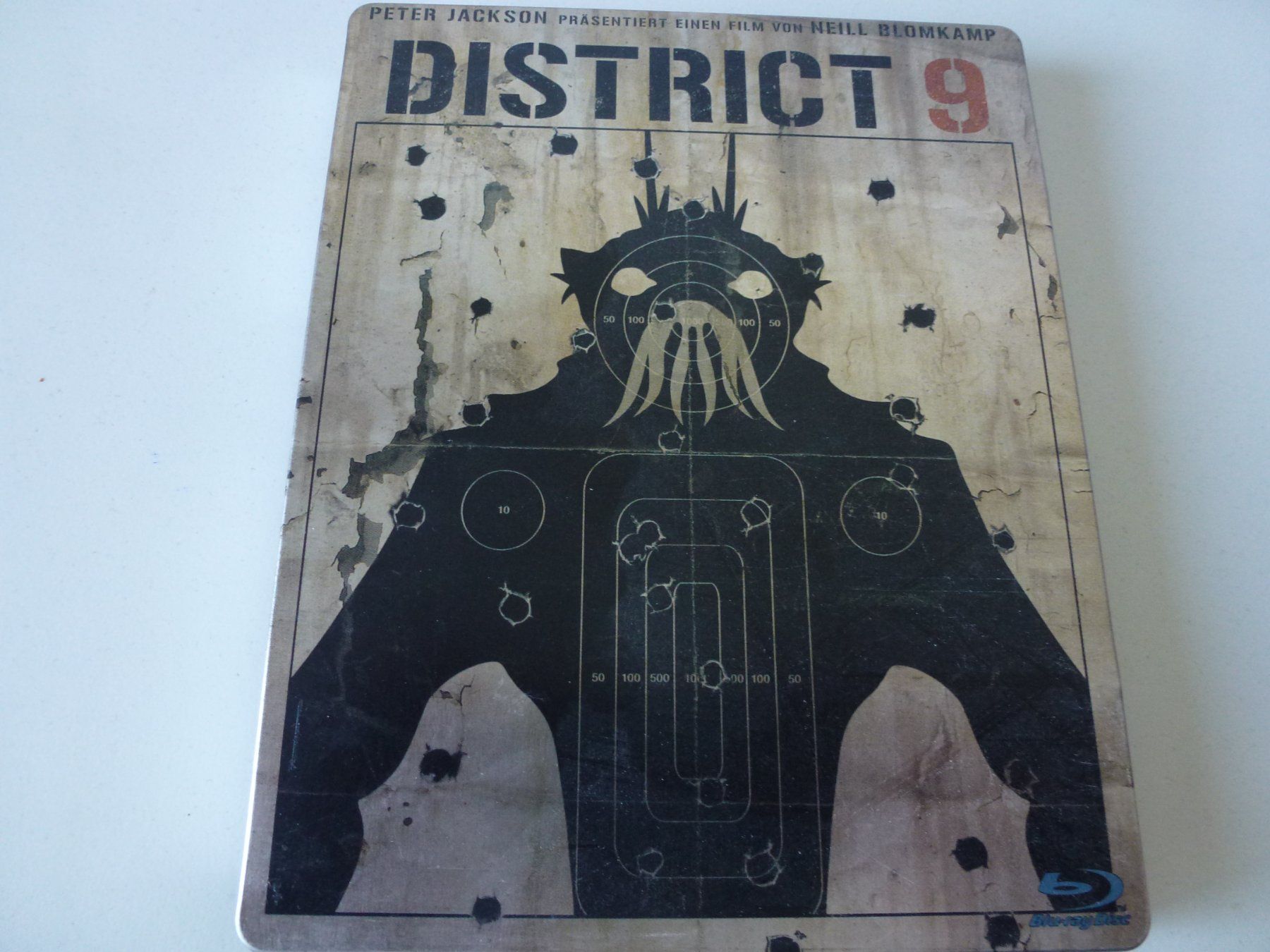 Tutti i DVDs: District 9 (Steelbook Blu-Ray) – Nuovo (secondo la descrizione) da Bern venduto da Frebo