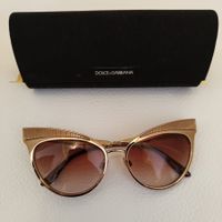 Occhiali da sole Dolce & Gabbana dorati con custodia