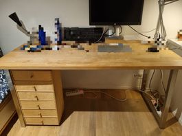 Wooden desk with metallic feet