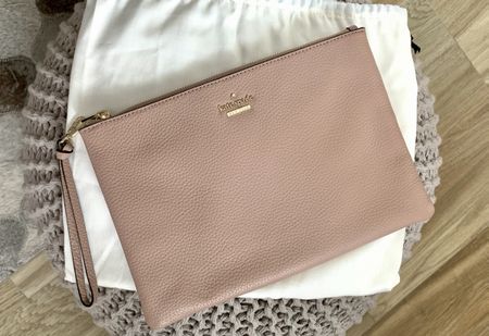 Kate Spade Blush pink leather clutch with gold logo