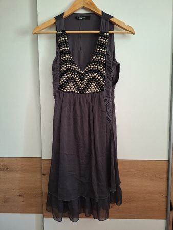 a vendre en l état...peu portée..tunique /robe