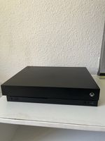 Xbox One X Console + 2 Games - Great for Winter Gaming! 🎮