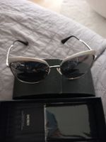 sunnglase Prada