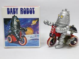 Roboter Baby Robot auf 3-Rad mit Klingelton zum aufziehen