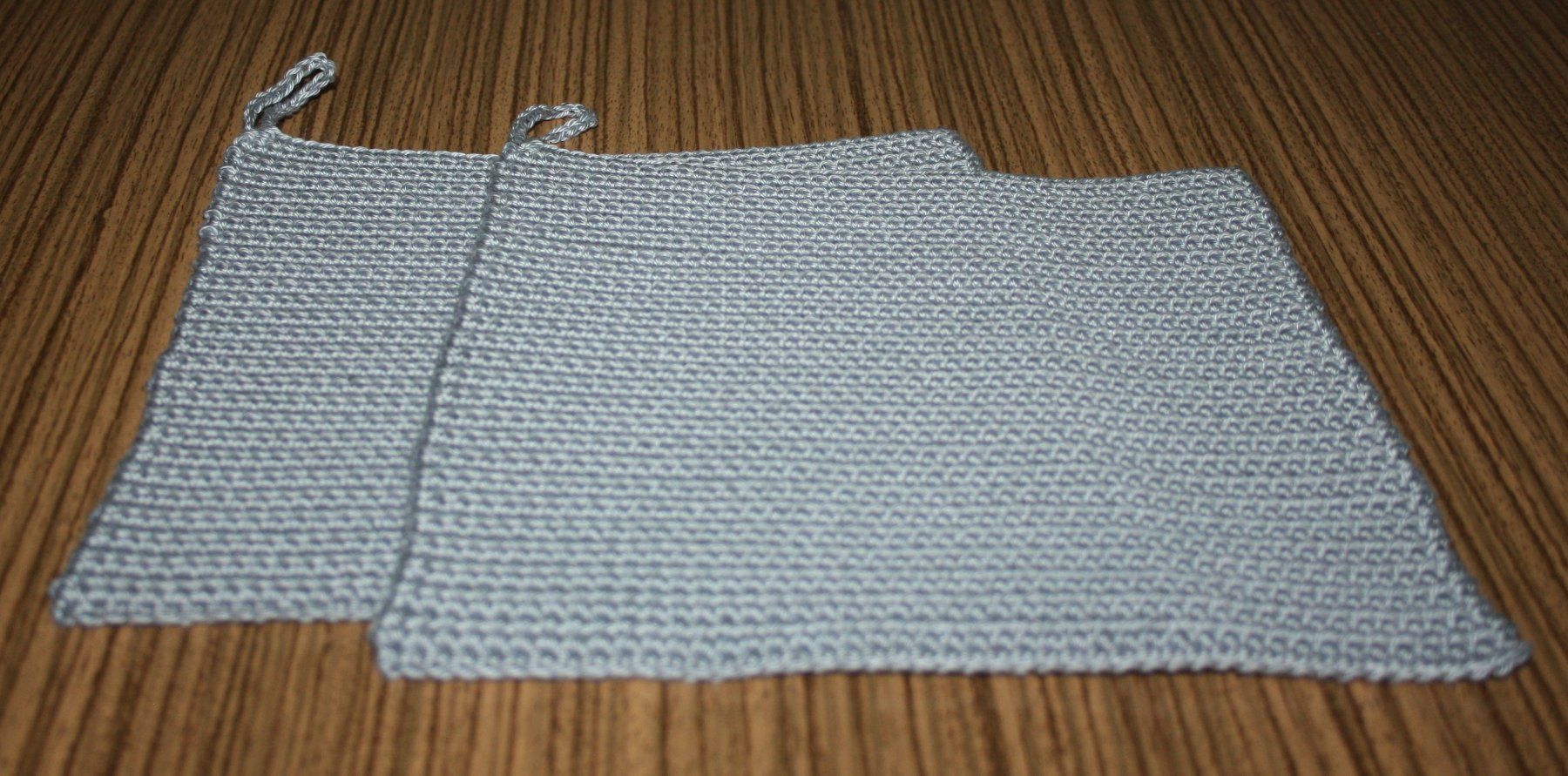Cucine complete: 2 Topflappen Baumwolle 20 x 19 grau  NEU – Nuovo (secondo la descrizione) da Flüelen venduto da Diversicum-Shop