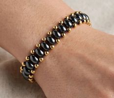 Bracciale pietra naturale ematite e perle dorate