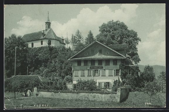 Cartoline postali: AK Flüeli, Gasthaus Flüeli und Kirche – Usato da Berlin venduto da bartko-reher