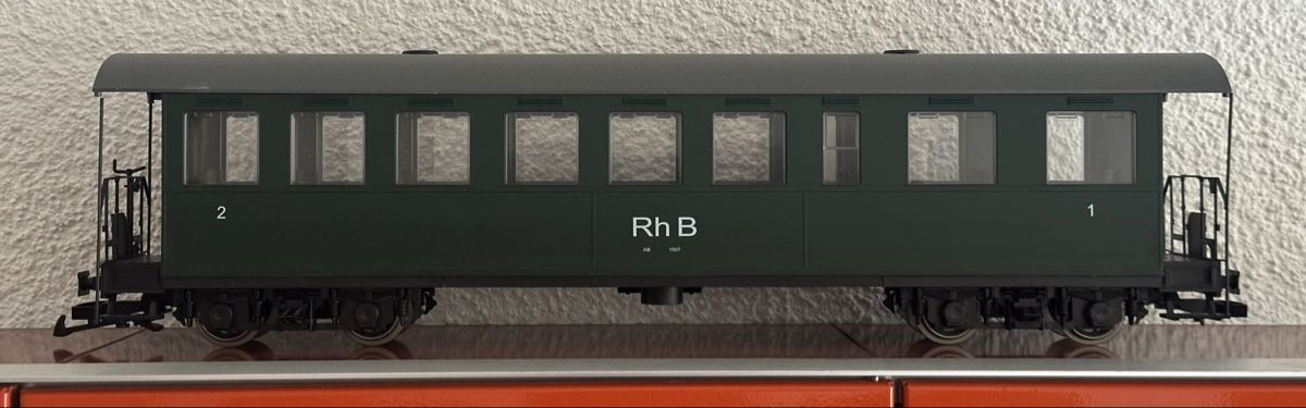 Modellini di ferrovie: RhB Plattform Wagen  – Nuovo e nell'imballaggio originale da Ostermundigen venduto da Bahnfan 1