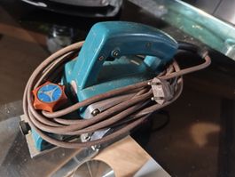 Elektrohobel Makita 1002, 600 Watt, gebrauchter Zustand Def.