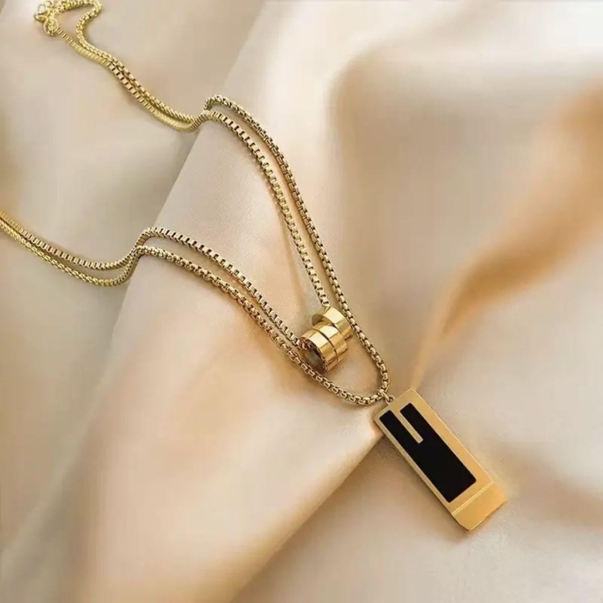Catenine: Elegante Doppelkette Gold Titanium  Neu – Nuovo e nell'imballaggio originale da Oberwangen TG venduto da Bash-B 1