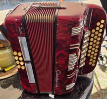 Accordéon Champion rouge, instrument musical