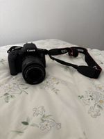 Canon EOS 750D Spiegelreflexkamera mit Ladegerät