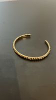 Fossil Armreif goldfarben mit Steinen 