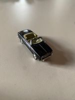 H0 schwarzer Peugeot 403 Cabriolet 1/87 der Marke Norev.
