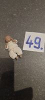 Miniatur Puppenstubenpuppchen dunkel