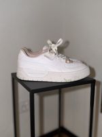 Weisse Puma Sneaker
