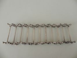 11 vintage Messerbänkchen/Messerhalter - versilbert