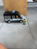 Polizeifahrzeug Spielzeug mit Figur, guter Zustand