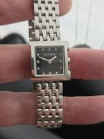 Montre femme Escada acier cadran noir index diamants