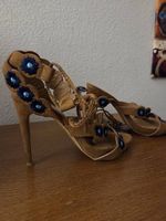 High Heels / Sandalen mit Absatz braun