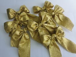 Goldene Schleifen,, zum Dekorieren. 7 Stück.