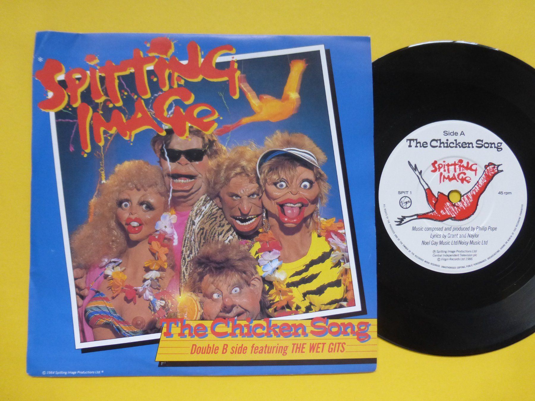 Vinyles: Spitting Image – The Chicken Song – D'occasion à Zürich par Swiss57