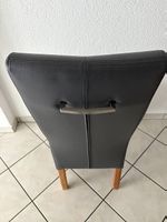 1 Essstuhl dunkelgrau