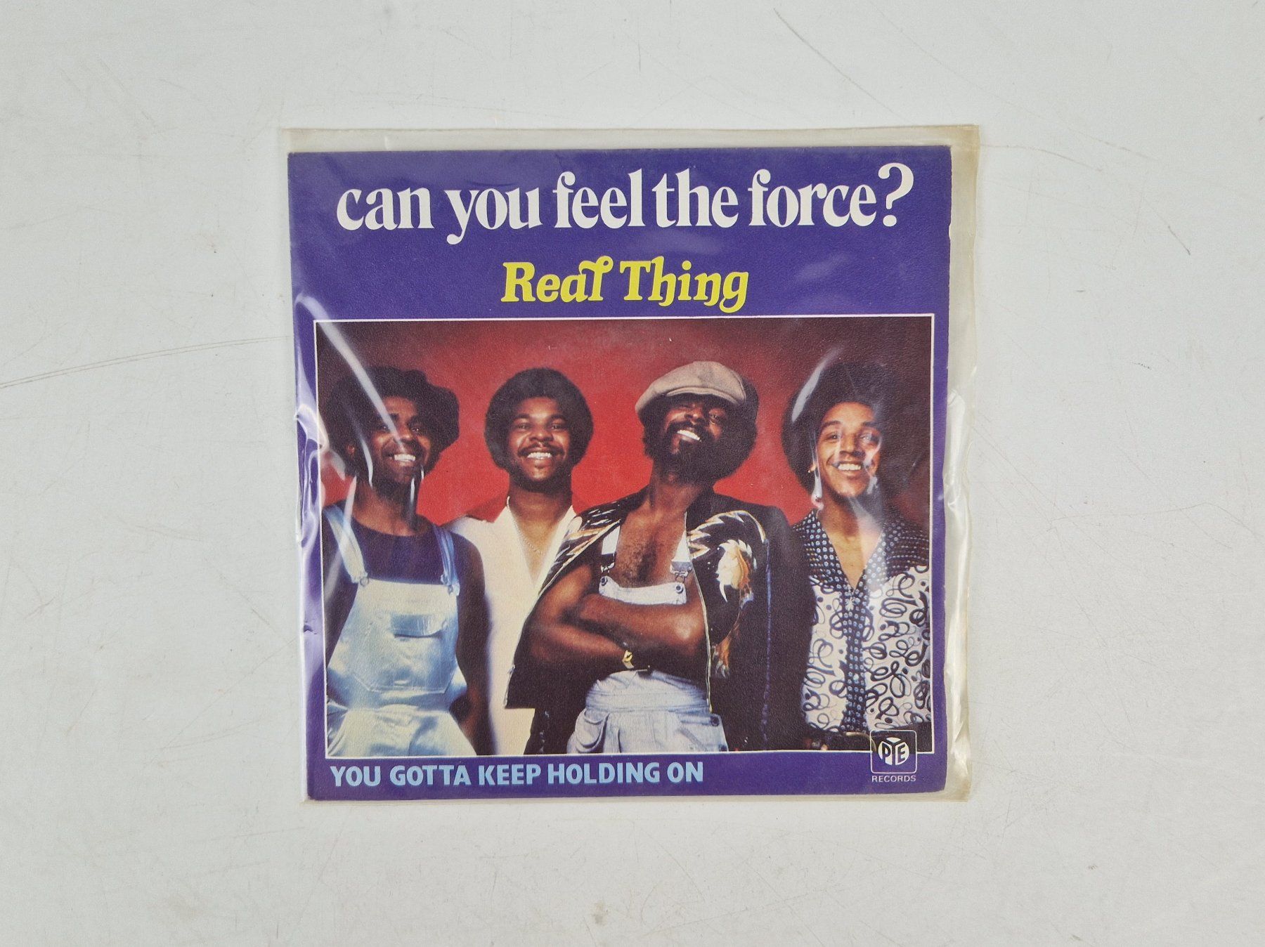 Vinyles: The Real Thing (1 Single) – D'occasion à Muhen par Restwert_Muhen