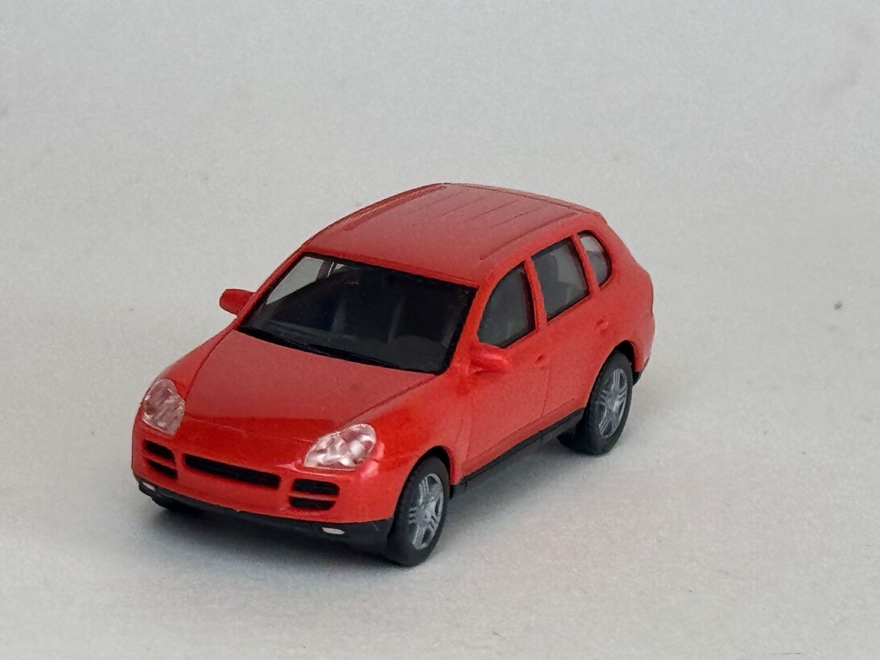 Herpa Modellini d'auto: Herpa Porsche Cayenne orange – Usato da Elm venduto da Wikmtz