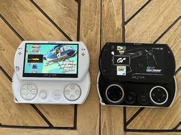 2 PSP go in weiss und schwarz inkl. Spiele