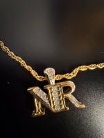 Nina Ricci Monogramm Halskette Goldfarben
