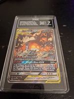 Reshiram & Charizard GX SM201 TAG 7 Grade