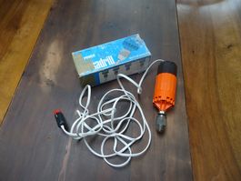 Petite perceuse (modèle ancien) branchable sur allume-cigare