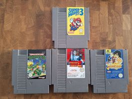 Lot de 4 jeux Nintendo NES - Super Mario3  Tortues Ninja...