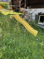 gelbe Kinderrutschbahn für den Garten