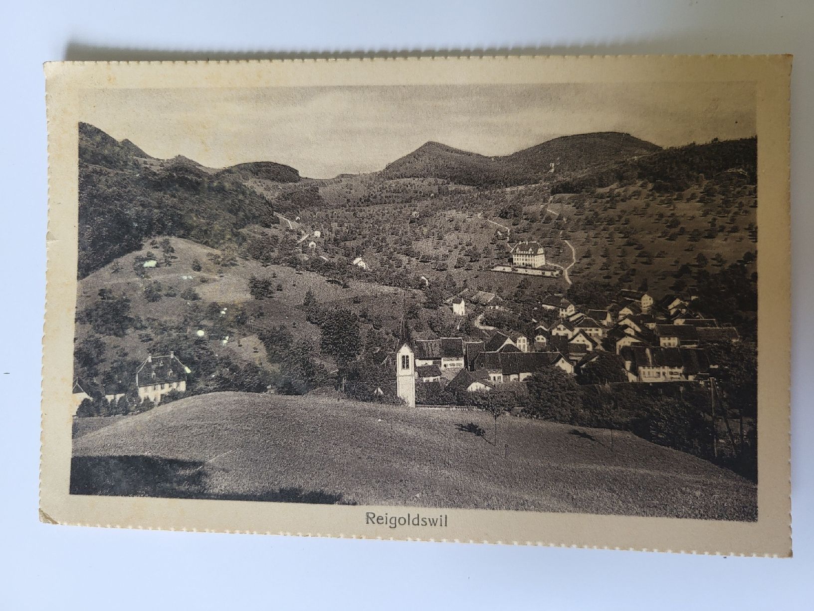 Cartoline postali: Alte Ansichtskarte Reigoldswil mit Kirche, 1928 – Usato da nunningen venduto da mic_88k2