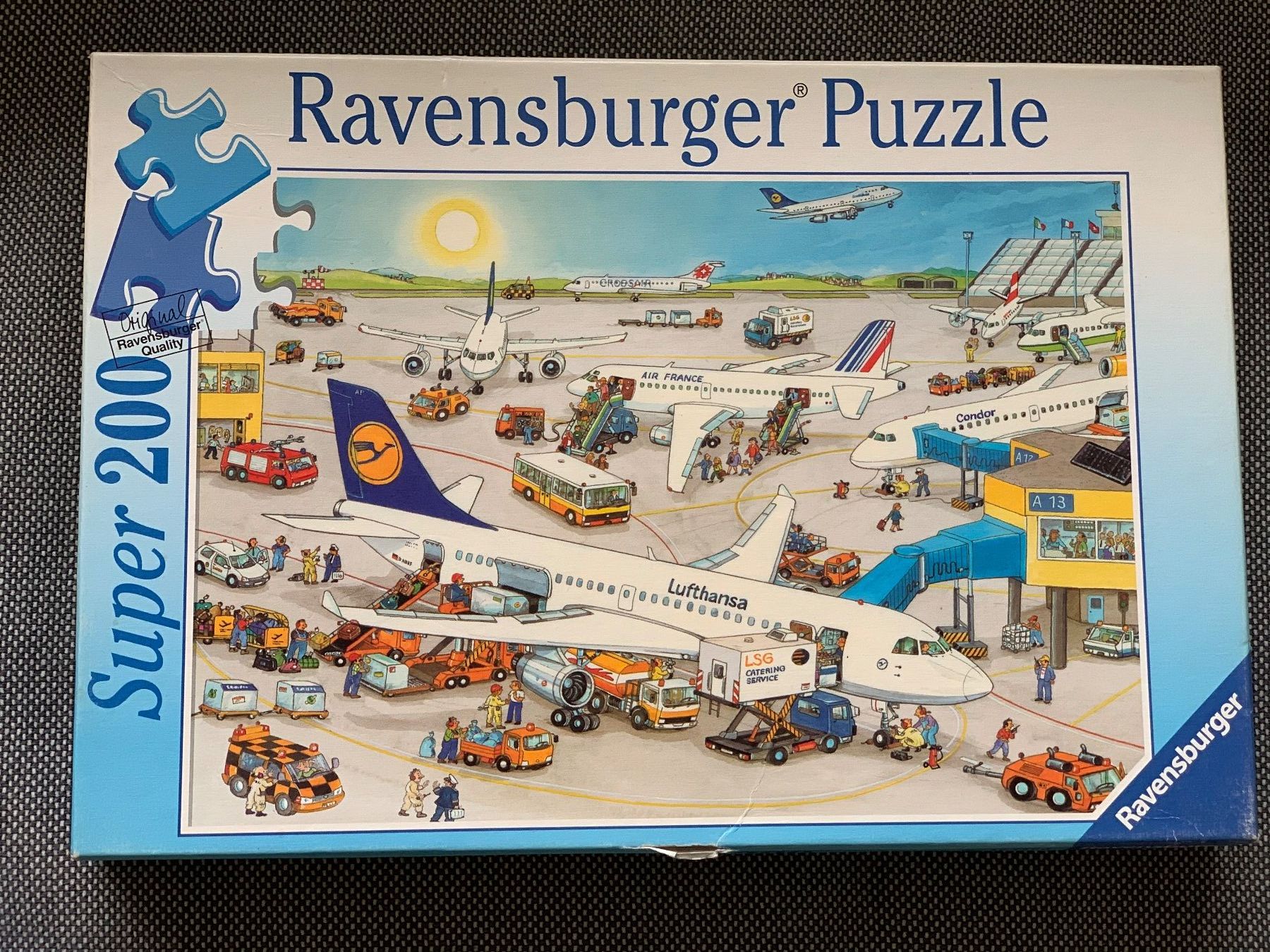 Ravensburger Puzzles: Ravensburger Puzzle "Auf dem Flughafen" – Gebraucht aus Birmensdorf ZH von eva.bari