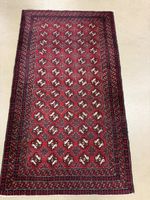 Orientteppich rot geometrisches Muster gebrauchter Zustand