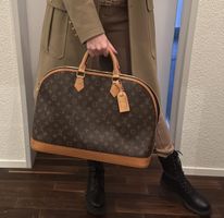 Louis Vuitton Monogram Alma Voyage MM Bag