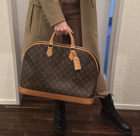 Louis Vuitton Monogram Alma Voyage MM Bag