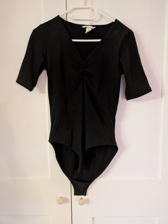 Damen Body schwarz in Grösse S, Rippstoff guter Zustand