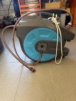 Schlauchaufroller mit Wandhalterung gebraucht guter Zustand