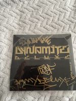 Dynamite Deluxe Grüne Brille xs Hülle signiert (ohne cd)