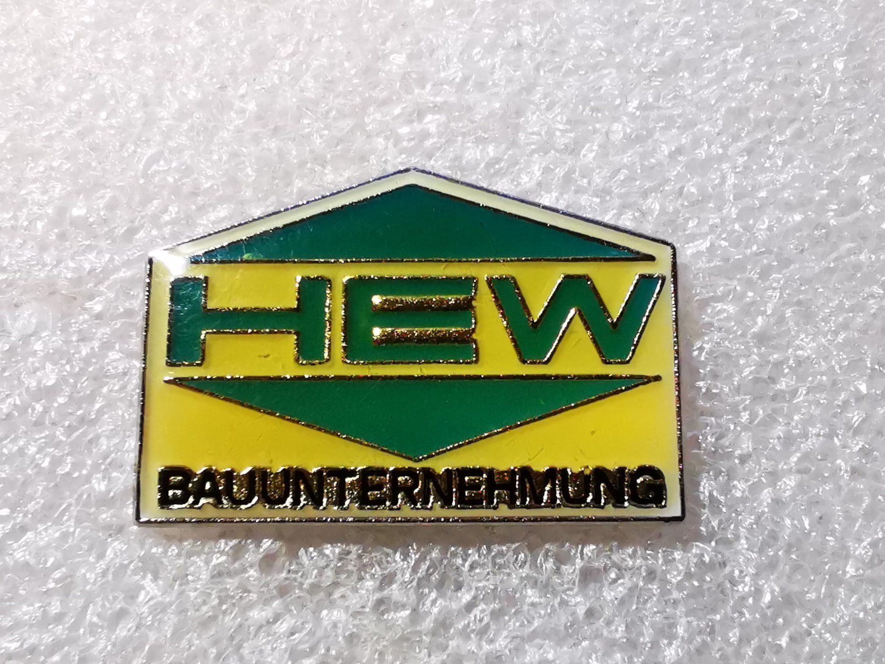 Placchette & Badge: Ansteckpin 34: HEW – Usato da Oppligen venduto da Pin-Fall-Shop