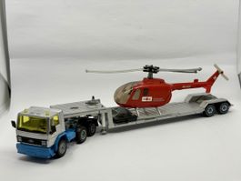 SIKU 2125 Ford Cargo Hubschraubertransporter + REGA Bo 105